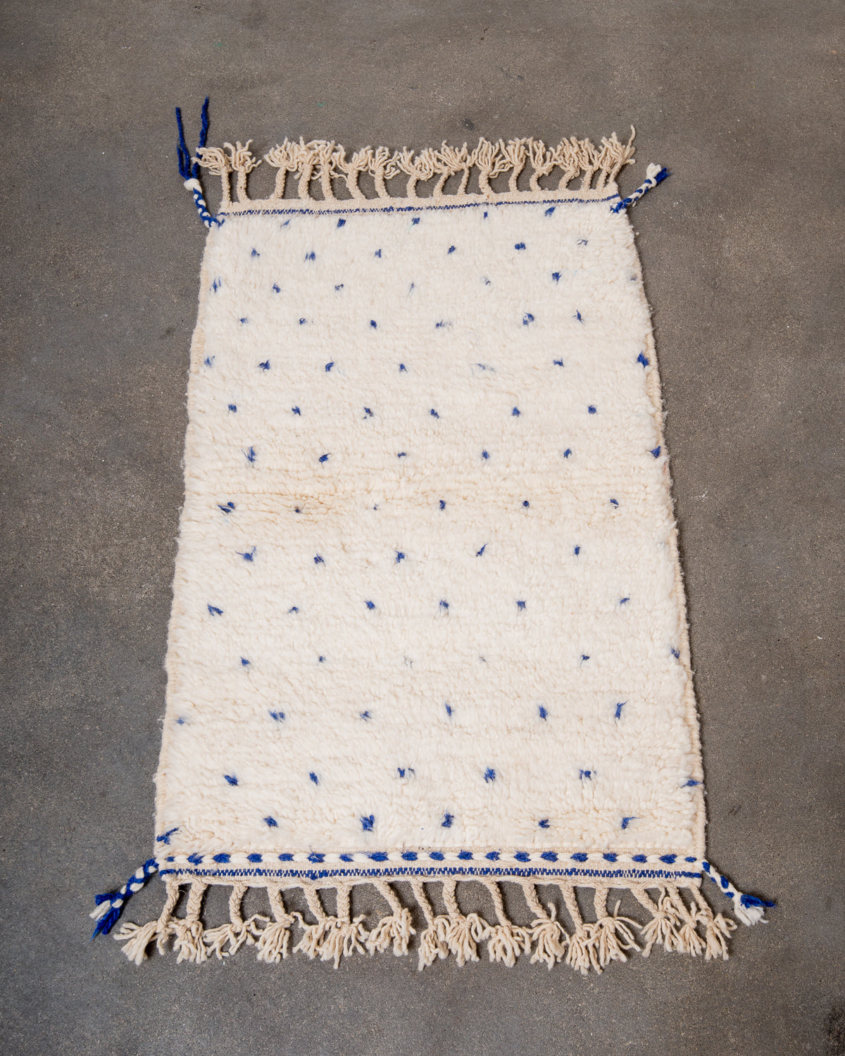 Modern, designer, handcrafted Berber rug from Morocco. Beniourain carpet with beautiful colours and patterns and fluffy wool texture.